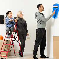 happy-young-family-renovating-their-home-paint-wall-with-paint-roller-mother-is-standing-ladder-smiling 1